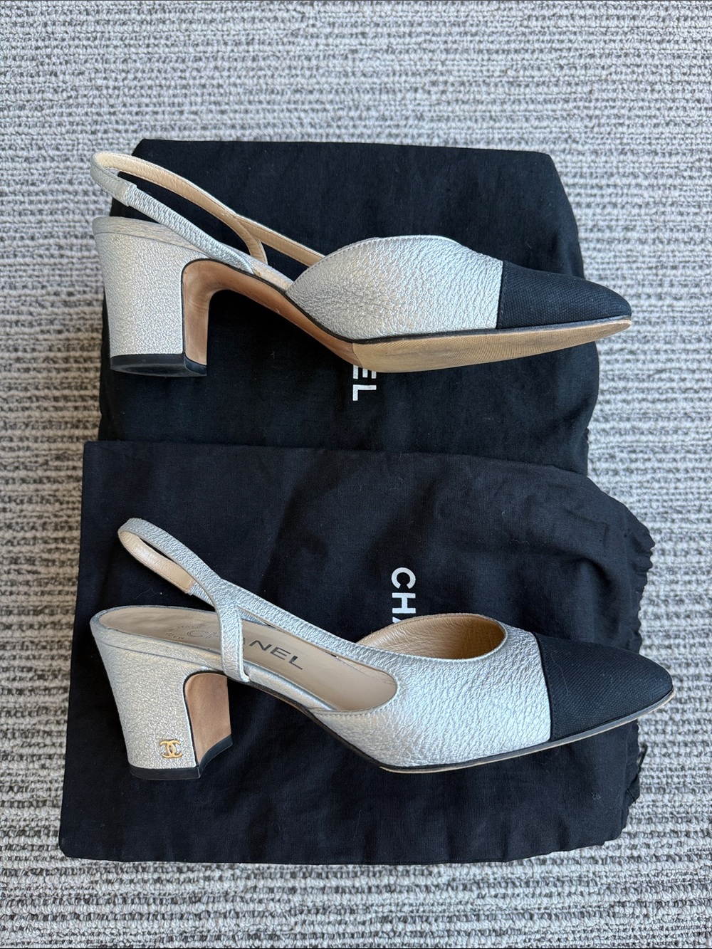 CHANEL Silver Leather and Black Cap-Toe Slingback Heels